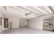 Spacious garage featuring an updated garage door and water purification system at 261 Venezia Ct, Punta Gorda, FL 33950