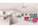Open-concept kitchen with marble island, stainless steel appliances, and ample counter space at 261 Venezia Ct, Punta Gorda, FL 33950