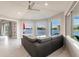 Beautiful water views from the seating area in this spacious living room at 261 Venezia Ct, Punta Gorda, FL 33950