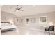 Spacious main bedroom featuring natural light, neutral tones, and marble-look floors at 261 Venezia Ct, Punta Gorda, FL 33950