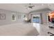 Bright main bedroom with a waterfront view, ceiling fan, and modern style at 261 Venezia Ct, Punta Gorda, FL 33950