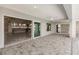 Expansive patio with sliding glass doors leading to the home's interior, and ceiling fan at 261 Venezia Ct, Punta Gorda, FL 33950