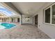 Screened in pool and patio area with tile flooring at 261 Venezia Ct, Punta Gorda, FL 33950