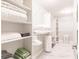 Organized walk-in closet featuring white shelving and ample storage space at 261 Venezia Ct, Punta Gorda, FL 33950