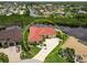 Aerial view of the property highlighting the home, canal, boat dock, and waterfront location at 3506 Saint Florent Ct, Punta Gorda, FL 33950