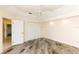 Bedroom with stylish floors, a ceiling fan, and double door closet at 3506 Saint Florent Ct, Punta Gorda, FL 33950