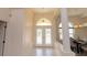 The foyer boasts high ceilings and decorative chandeliers at 3506 Saint Florent Ct, Punta Gorda, FL 33950