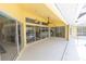 Spacious covered lanai with multiple sliding glass doors into the home at 3506 Saint Florent Ct, Punta Gorda, FL 33950
