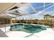 The pool features turquoise tile trim and a screen enclosure at 3506 Saint Florent Ct, Punta Gorda, FL 33950