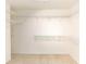 An empty walk-in closet featuring white shelves at 3506 Saint Florent Ct, Punta Gorda, FL 33950
