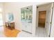 Convenient wet bar featuring mirrored backdrop and cabinetry, situated near a walk-in closet at 3506 Saint Florent Ct, Punta Gorda, FL 33950