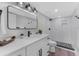 Bright bathroom features a modern vanity, sleek fixtures, and tiled shower, creating a spa-like experience at 3548 Mondovi Ct, Punta Gorda, FL 33950