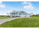 Lovely two-story home with a three-car garage, paver driveway, and well-maintained lawn at 3548 Mondovi Ct, Punta Gorda, FL 33950