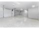 Spacious three car garage with epoxy flooring and plenty of room for parking and storage at 3548 Mondovi Ct, Punta Gorda, FL 33950