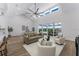 Bright living room with sliding glass doors to outside views and comfortable seating at 3548 Mondovi Ct, Punta Gorda, FL 33950
