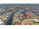 Aerial view of waterfront community featuring boat docks, homes, and canals at 3800 Bal Harbor Blvd # 414, Punta Gorda, FL 33950
