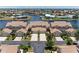 Stunning aerial view of waterfront condos with lush landscaping and private boat docks at 3800 Bal Harbor Blvd # 414, Punta Gorda, FL 33950