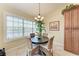 Inviting breakfast nook features a round table and view to the waterway at 3800 Bal Harbor Blvd # 414, Punta Gorda, FL 33950