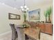 Dining room features a decorative chandelier and furniture at 3800 Bal Harbor Blvd # 414, Punta Gorda, FL 33950
