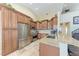 Spacious kitchen showcases custom cabinetry, stainless steel appliances, and granite countertops at 3800 Bal Harbor Blvd # 414, Punta Gorda, FL 33950