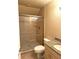 Tiled bathroom with shower and granite vanity at 4150 Enclave Pl, Punta Gorda, FL 33980