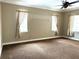 Spacious bedroom featuring neutral tones, carpet, and ample natural light at 4150 Enclave Pl, Punta Gorda, FL 33980