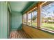 The bright and sunny balcony overlooks the green lawn and nearby buildings at 4346 Rayfield Dr # 4346, Sarasota, FL 34243
