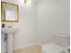 Updated half bathroom features stylish pedestal sink and modern fixtures at 4346 Rayfield Dr # 4346, Sarasota, FL 34243