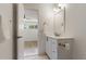 Bright bathroom featuring a white vanity and modern fixtures at 4346 Rayfield Dr # 4346, Sarasota, FL 34243