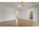 Large primary bedroom with ceiling fan and ensuite bathroom at 4346 Rayfield Dr # 4346, Sarasota, FL 34243