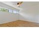 Empty bedroom with hardwood floors, a ceiling fan, and natural light at 4346 Rayfield Dr # 4346, Sarasota, FL 34243