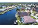 Beautiful waterfront property with private boat dock and screened pool, offering serene water views and easy canal access at 523 Saint Girons Ct, Punta Gorda, FL 33950