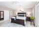 Cozy bedroom featuring a ceiling fan, a king-sized bed, and neutral wall art at 523 Saint Girons Ct, Punta Gorda, FL 33950