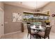 Breakfast nook with large window that overlooks the screened in pool and lake at 523 Saint Girons Ct, Punta Gorda, FL 33950