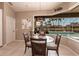 Breakfast nook overlooking the screened in pool and lake at 523 Saint Girons Ct, Punta Gorda, FL 33950