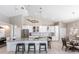 Bright kitchen features white cabinetry, stainless steel appliances, and a large center island with bar seating at 523 Saint Girons Ct, Punta Gorda, FL 33950