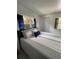 Cozy bedroom with comfortable bed, and a pleasant view from the window at 5727 Beechwood St, Punta Gorda, FL 33982