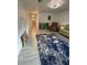 Bright living room featuring modern tile floors, comfortable seating, and neutral decor for a cozy atmosphere at 5727 Beechwood St, Punta Gorda, FL 33982