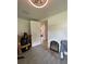 Room with wood-look tile flooring and open doorway at 5727 Beechwood St, Punta Gorda, FL 33982