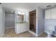 Bathroom with walk-in shower, closet, and traditional vanity at 711 Forest Hill Nw Ln, Port Charlotte, FL 33948