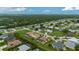 High-angle view of neighborhood featuring single Gathering homes in residential area near a greenbelt at 7512 Pon Kan, Punta Gorda, FL 33955