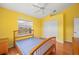 The sunny bedroom is equipped with a ceiling fan, closet, and window at 7512 Pon Kan, Punta Gorda, FL 33955