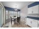 Cozy breakfast nook with a bay window overlooking the backyard and plenty of natural light at 7512 Pon Kan, Punta Gorda, FL 33955