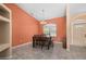 Cozy dining room with tiled floor, chandelier, and natural light at 7512 Pon Kan, Punta Gorda, FL 33955