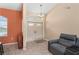 Bright entryway with a double front door, chandelier, and tiled floors at 7512 Pon Kan, Punta Gorda, FL 33955