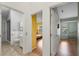 Interior shot of three rooms featuring bedrooms and bathrooms at 7512 Pon Kan, Punta Gorda, FL 33955