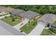 An aerial view of the home's roof, driveway and landscaping at 7652 Mikasa Dr, Punta Gorda, FL 33950