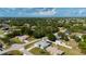 Aerial view showcasing the property's location, surrounding neighborhood, and lush greenery at 891 Bayard St, Port Charlotte, FL 33948