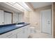 Hall bathroom with a single sink vanity and a toilet at 891 Bayard St, Port Charlotte, FL 33948