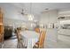 Open-concept living space blending the dining area, living room, and kitchen, with plenty of natural light at 891 Bayard St, Port Charlotte, FL 33948